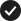white tick on a black circular background